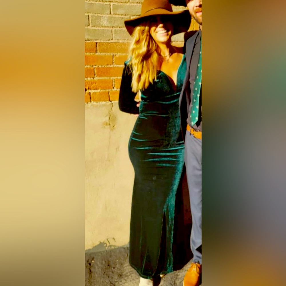 Worn twice, backless. Receive so many compliments in this flattering piece
